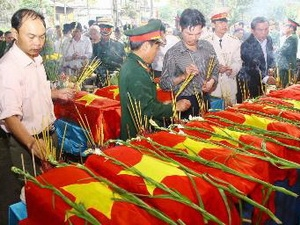 Lễ truy điệu, an táng 84 hài cốt liệt sỹ hy sinh ở Lào
